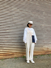 Load image into Gallery viewer, Mini bag shoulder (dark blue body and orange string)